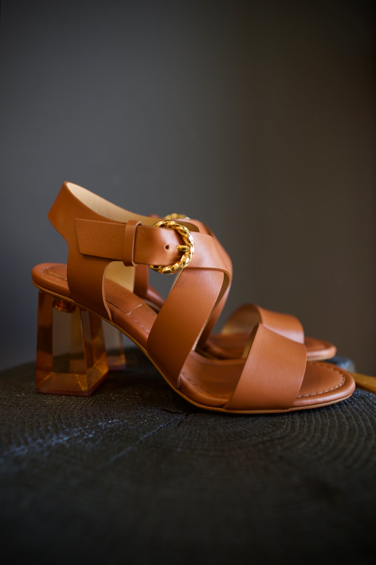 Ulla Johnson Elora Heels in Terra supple leather criss cross straps 3.25" lucite block heel. Sculptural, bohemian-inspired elegance
