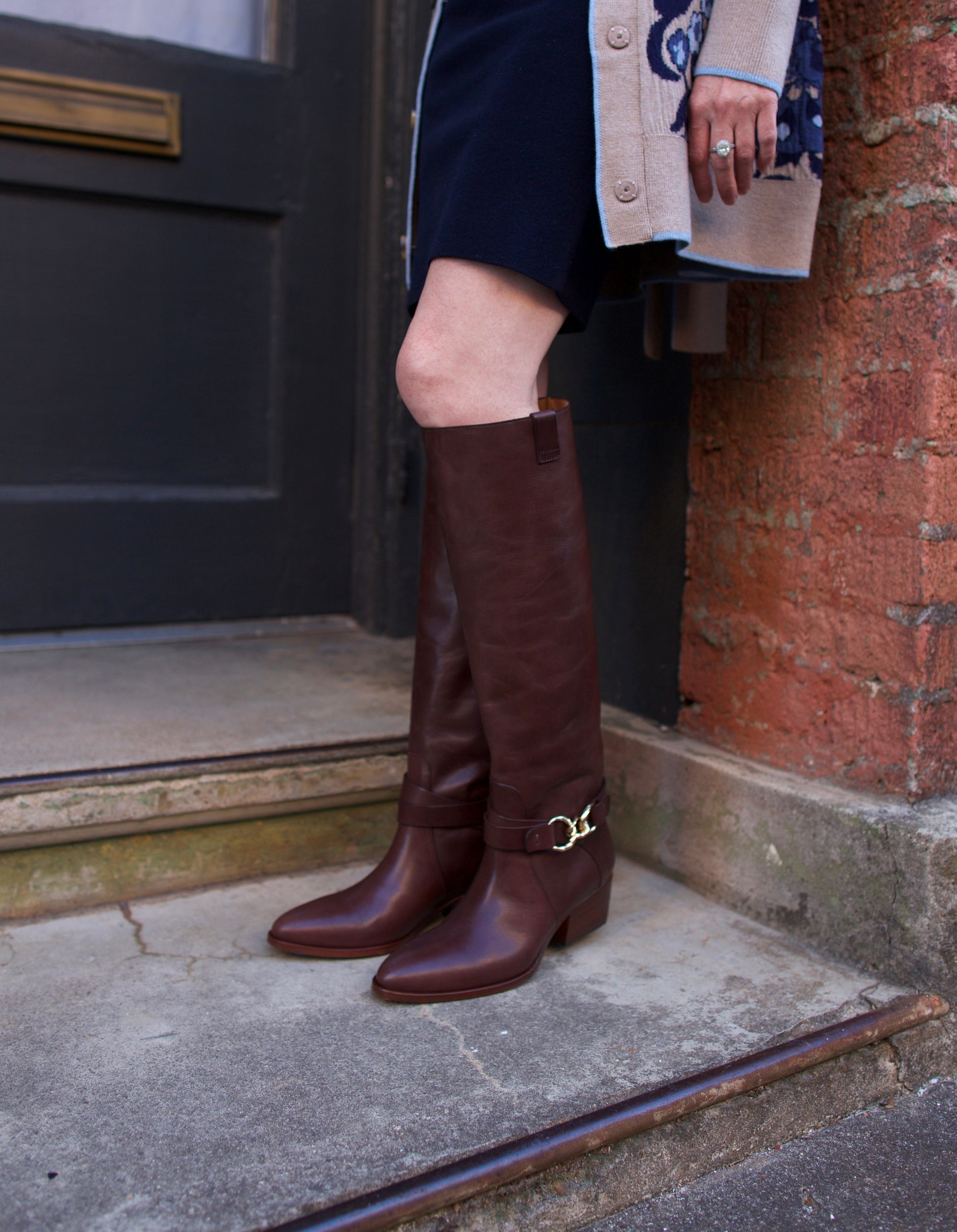 image of woman wearing the Ulla Johnson Willow Cowboy Boots