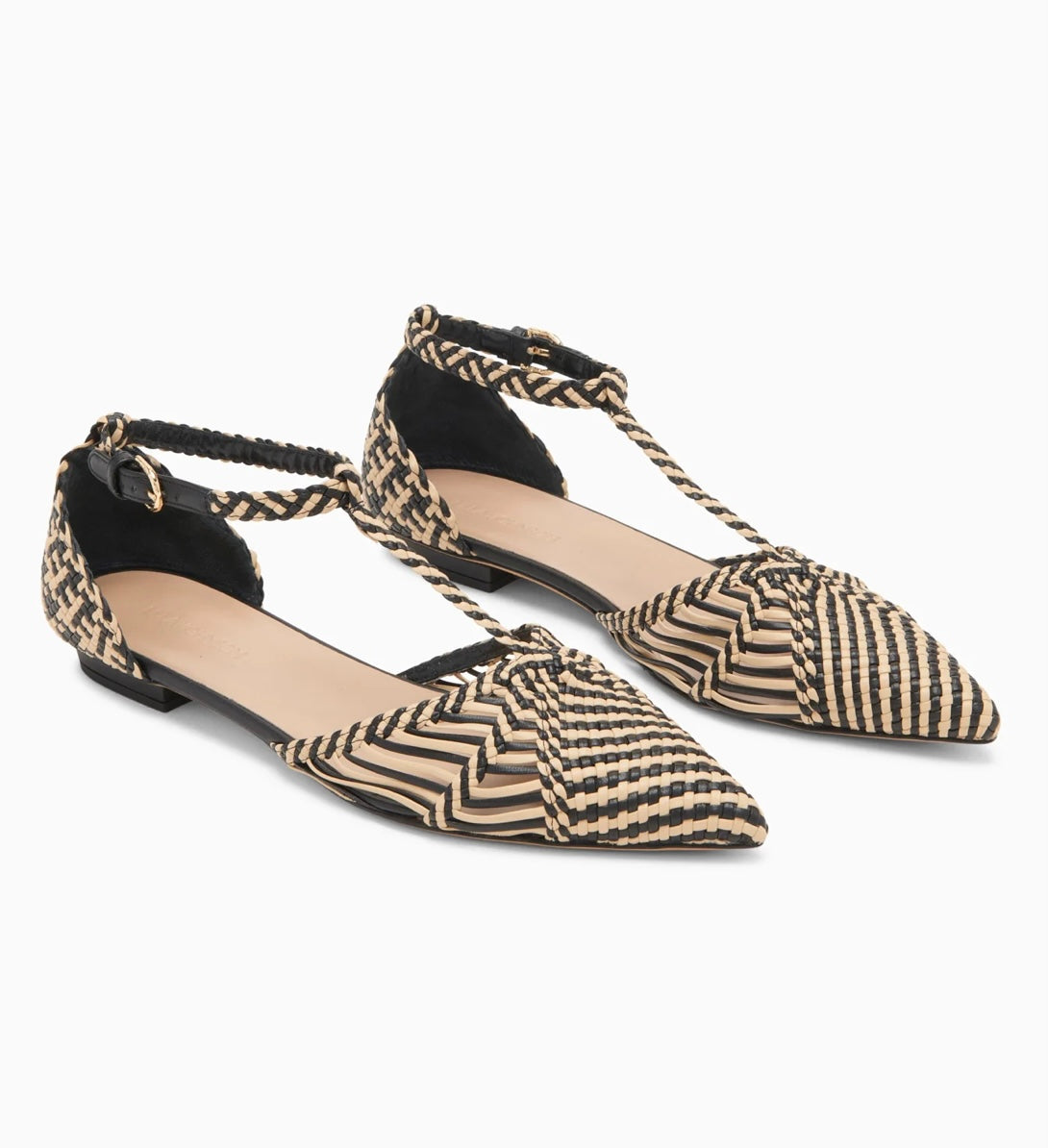 Ulla Johnson's Daria Flats in Black/Tan hand-woven vegan leather with a pointed toe and T-strap. Textural, artisan-crafted everyday elegance.