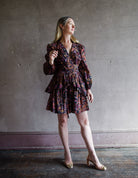 The Lulu cotton mini dress by Ulla Johnson features a v neckline with puff sleeves, tiered skirting and tailored bodice.