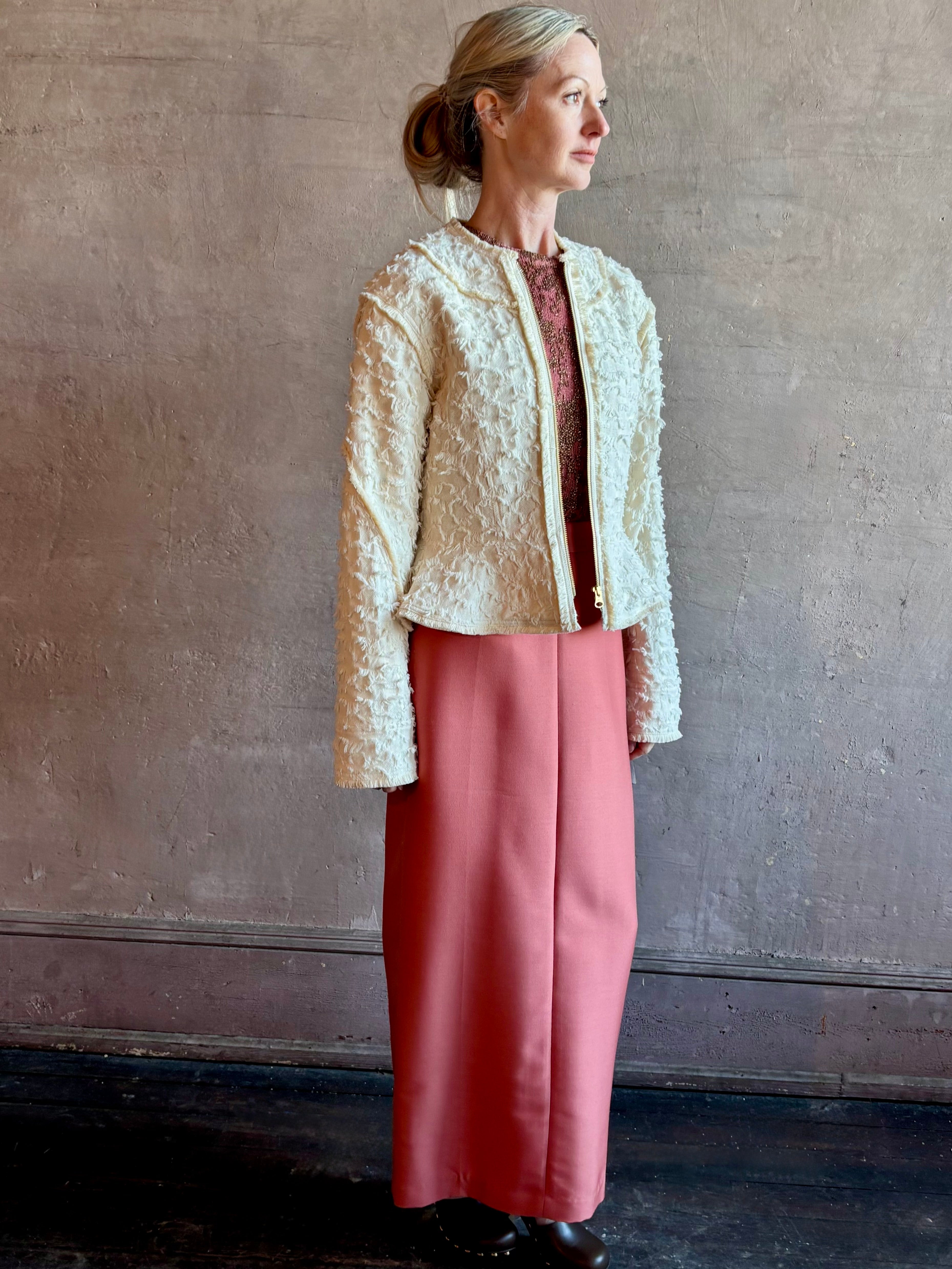 Image of woman wearing designer Ulla Johnson Rosalind tailored peplum Jacket in Premium Cotton with checkered fringe texture