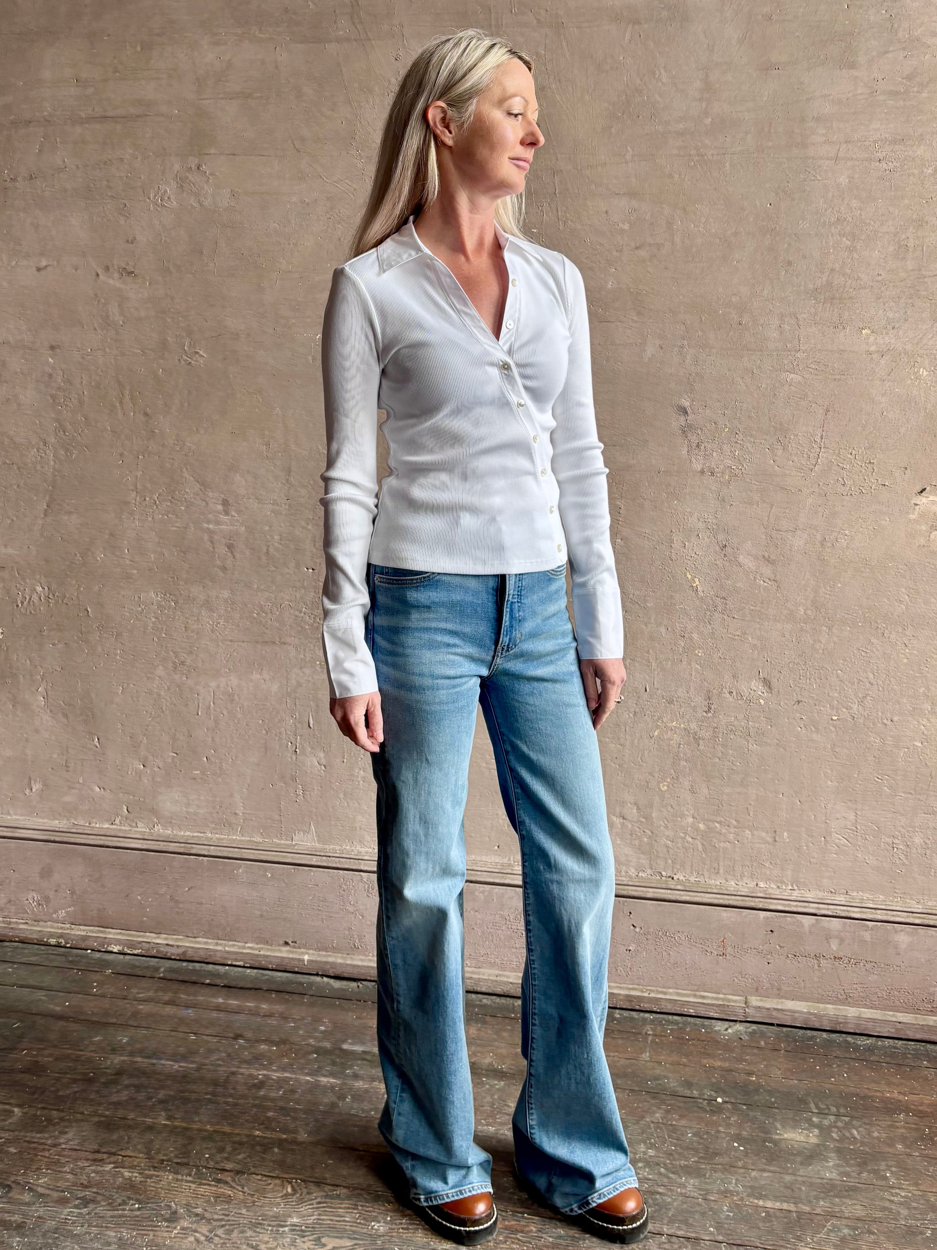 Image of mature woman wearing a VERONICA BEARD white Brenner Top in Premium Pima Cotton blend and expert tailoring