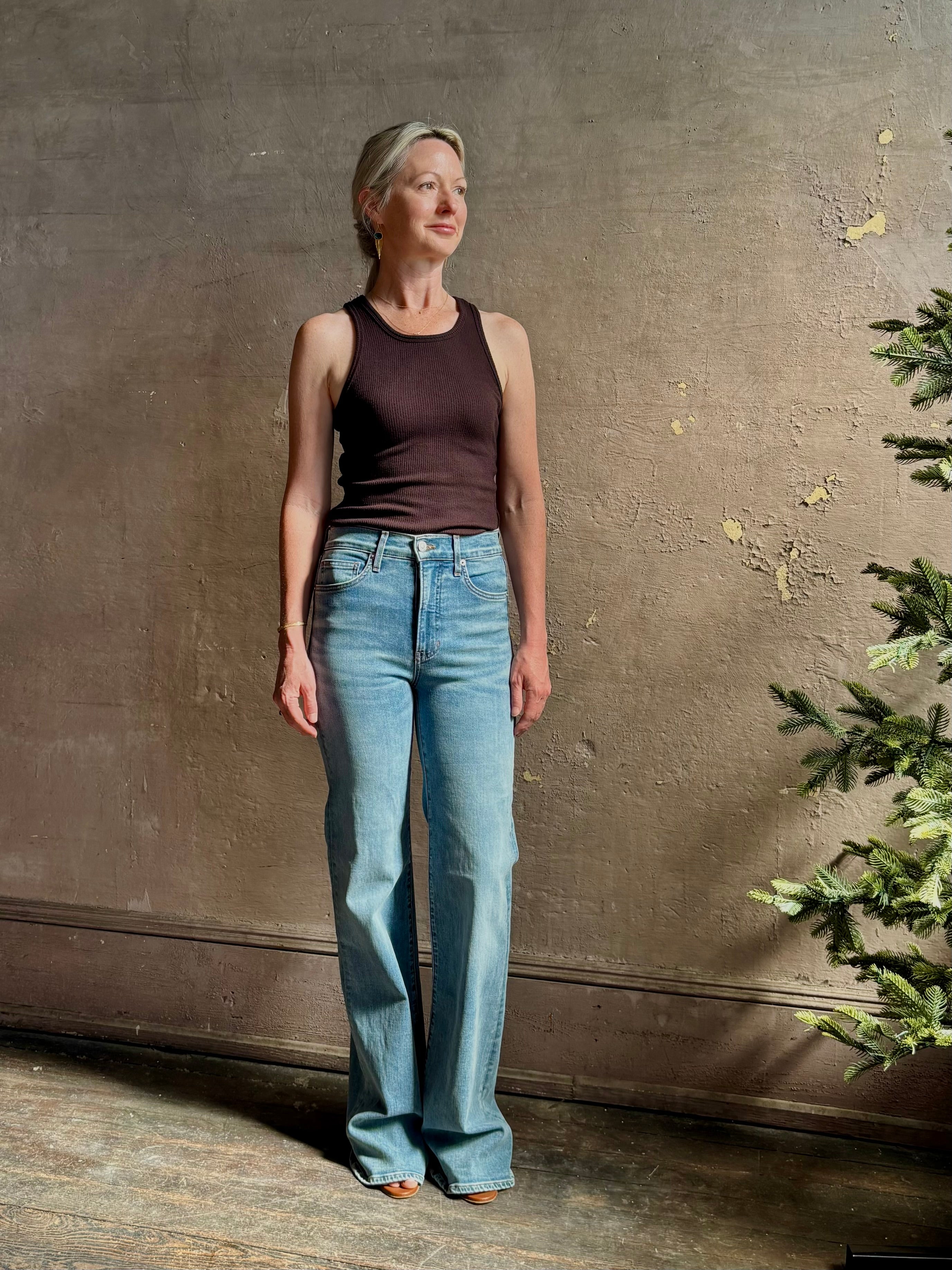 Mature woman wearing American-Made Veronica Beard Crosby Denim High Rise Straight Leg Jean Stretch Medium Wash