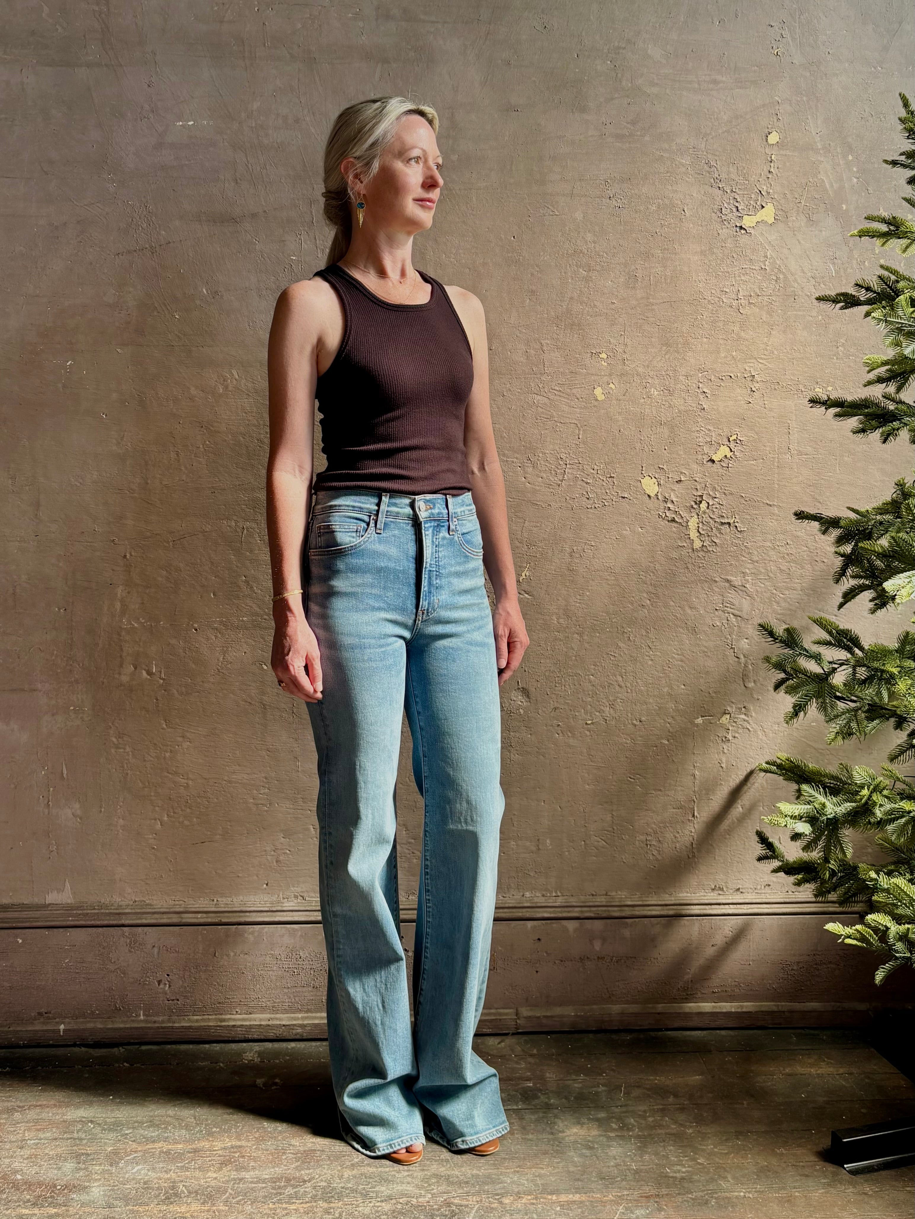 Mature woman wearing American-Made Veronica Beard Crosby Denim High Rise Straight Leg Jean Stretch Medium Wash