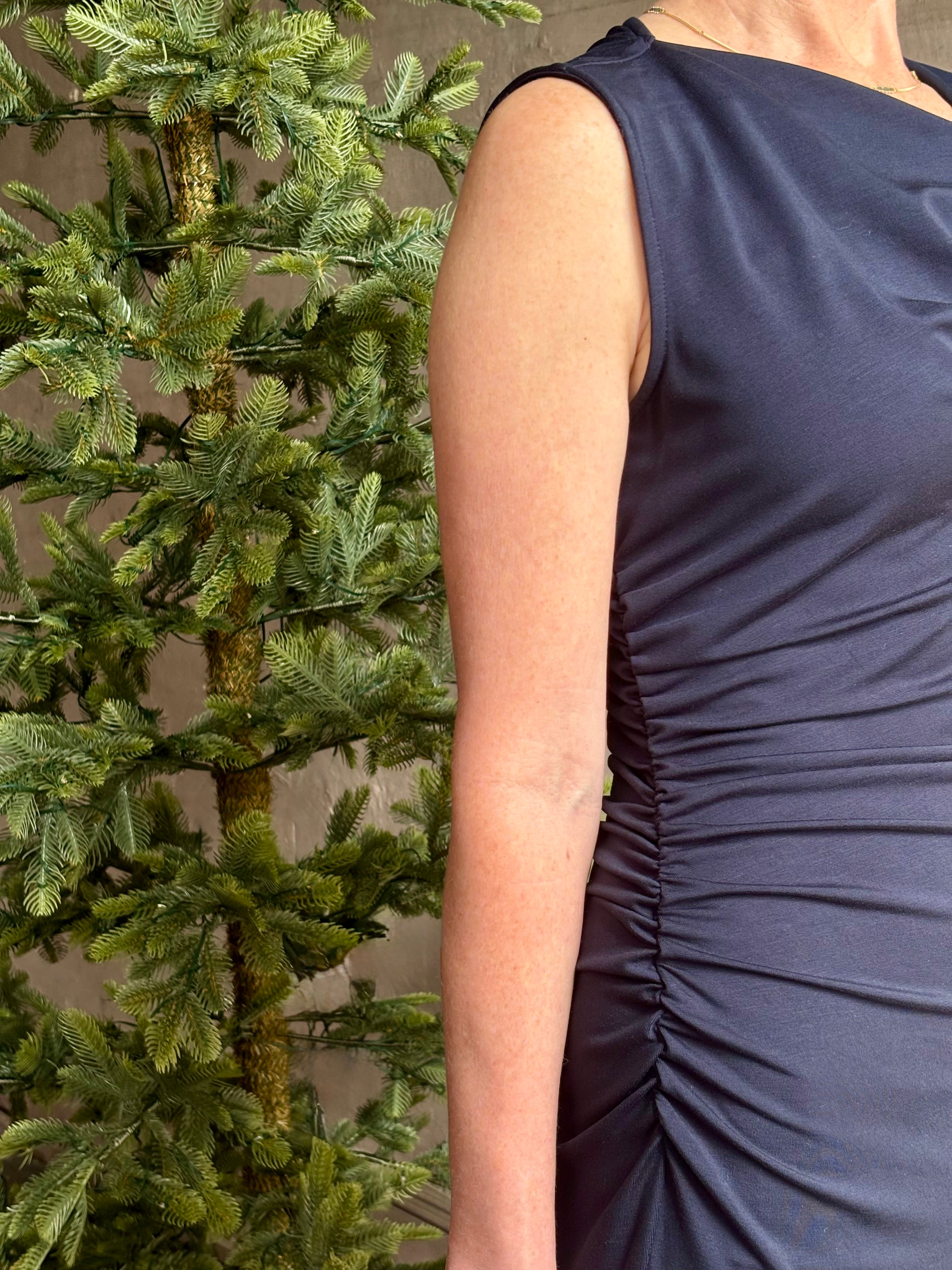 Mature woman wearing VERONICA BEARD Kerilyn navy blue maxi sheath Dress in a comfortable elevated casual wear fabric