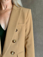 Mature woman wearing Veronica Beard Miller Dickey Jacket in Heritage Khaki tailored blazer flattering back darts