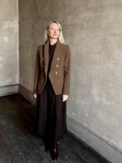 Woman wearing designer VERONICA BEARD tailored Miller Dickey Jacket in Walnut color with neutral buttons 