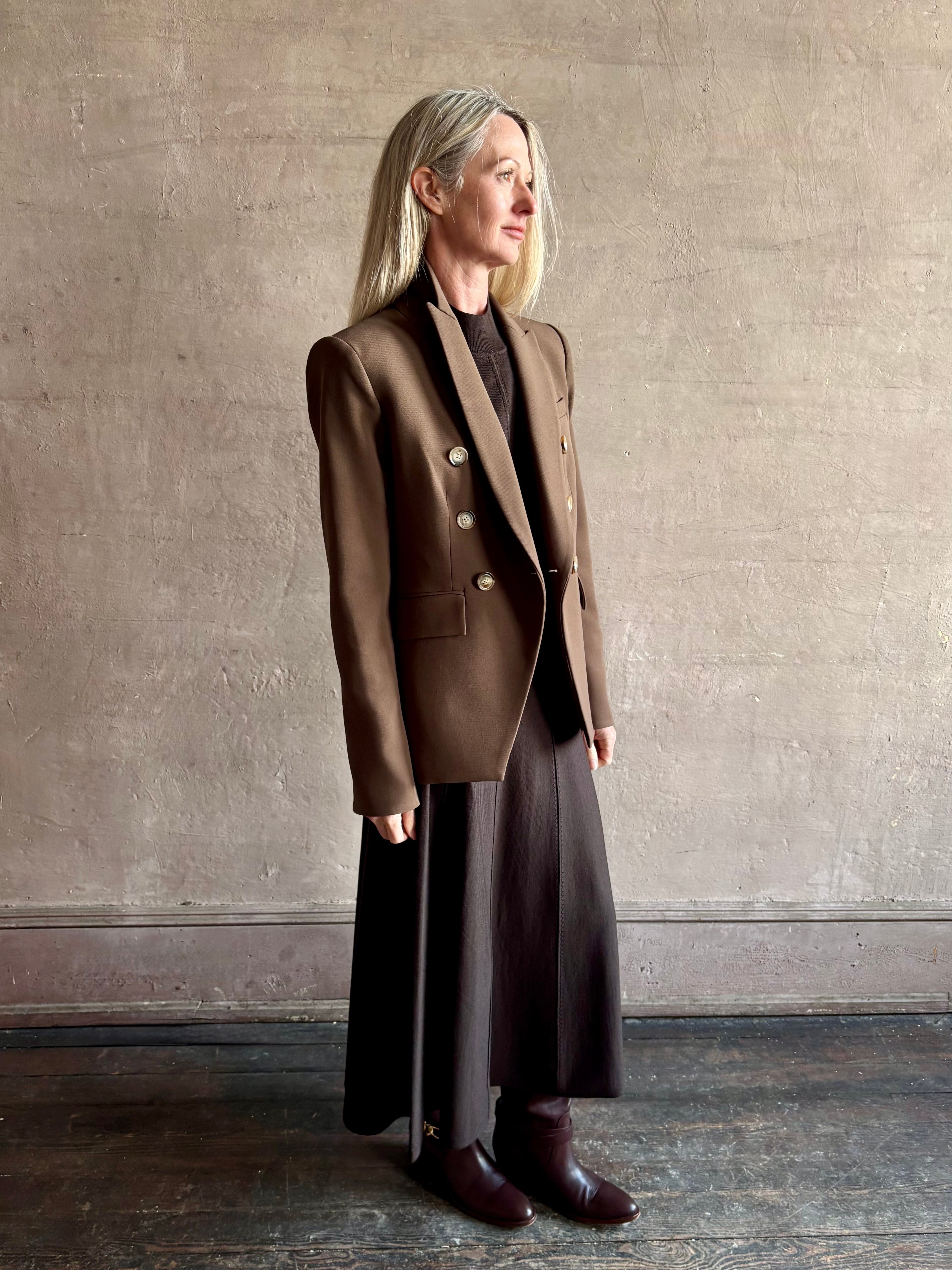Woman wearing designer VERONICA BEARD tailored Miller Dickey Jacket in Walnut color with neutral buttons 