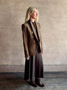Woman wearing designer VERONICA BEARD tailored Miller Dickey Jacket in Walnut color with neutral buttons 
