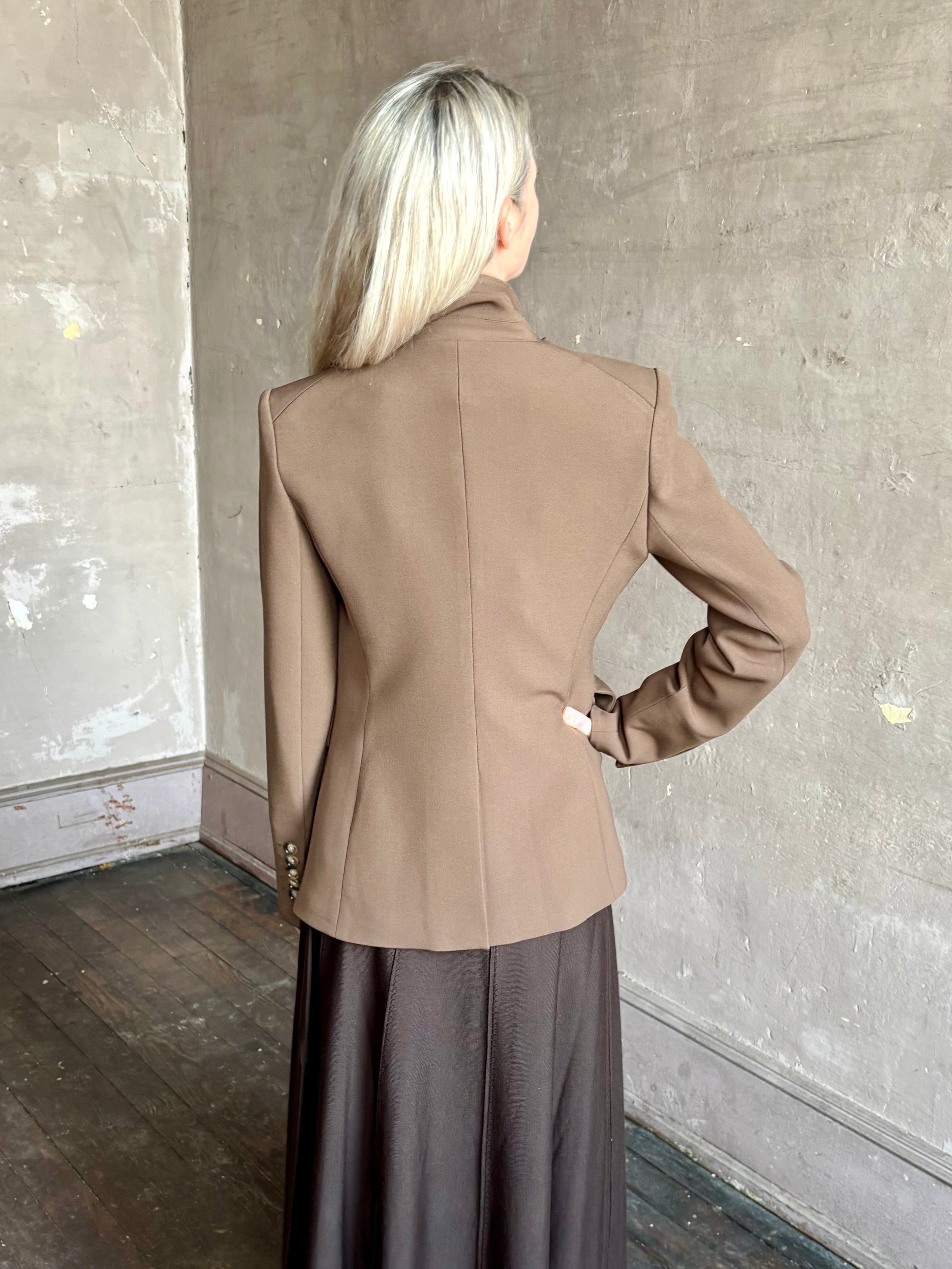 Woman wearing designer VERONICA BEARD tailored Miller Dickey Jacket in Walnut color with neutral buttons 