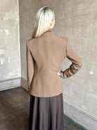 Woman wearing designer VERONICA BEARD tailored Miller Dickey Jacket in Walnut color with neutral buttons 