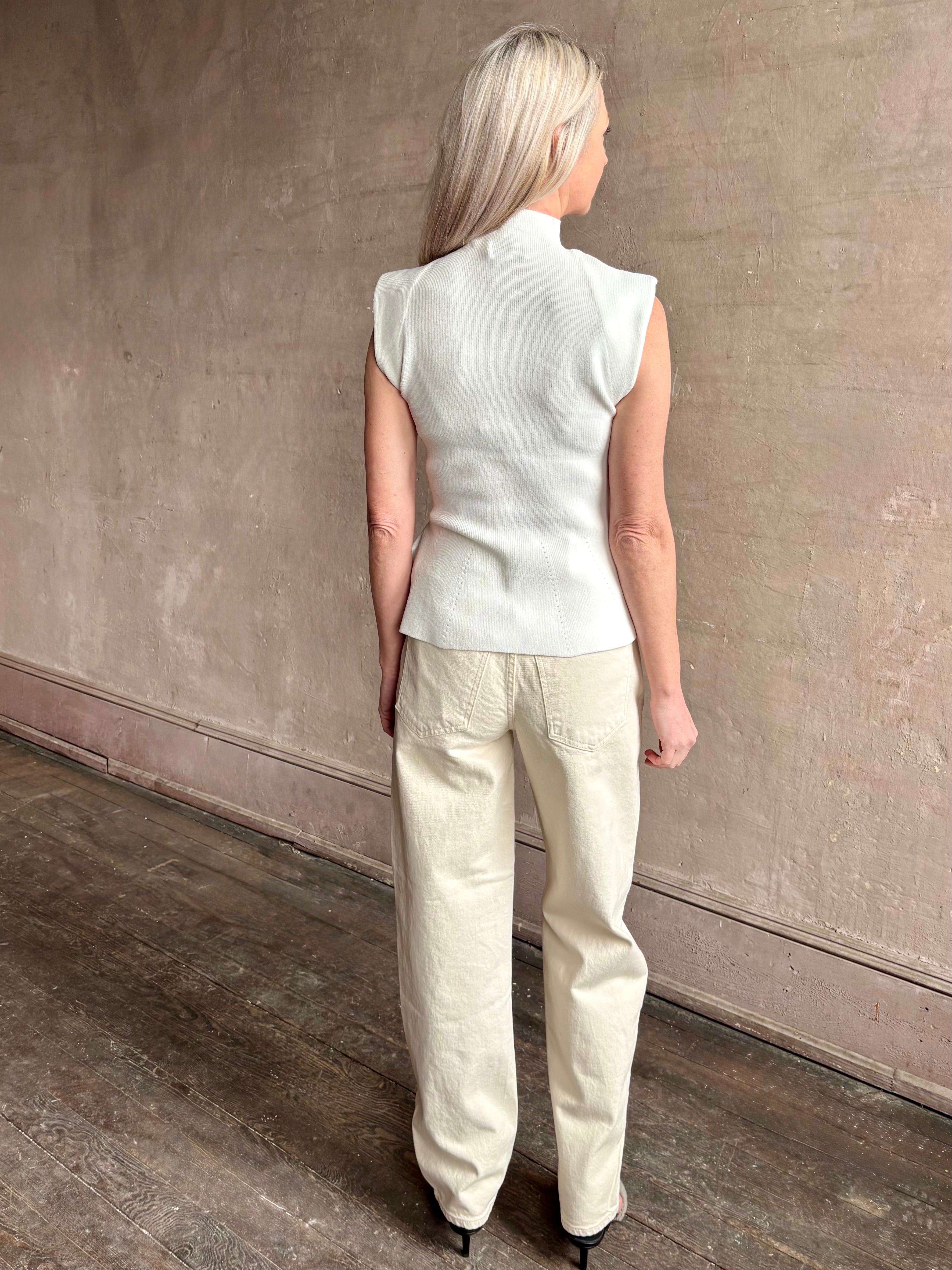 Image of mature woman wearing luxurious off white knit peplum top by VERONICA BEARD Seraphine Knit Shell with contemporary texture