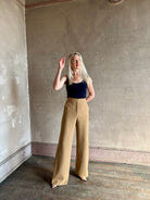 Woman wearing Veronica Beard Tonelli Pant Heritage Khaki flat-front beltless tailored trouser made in America