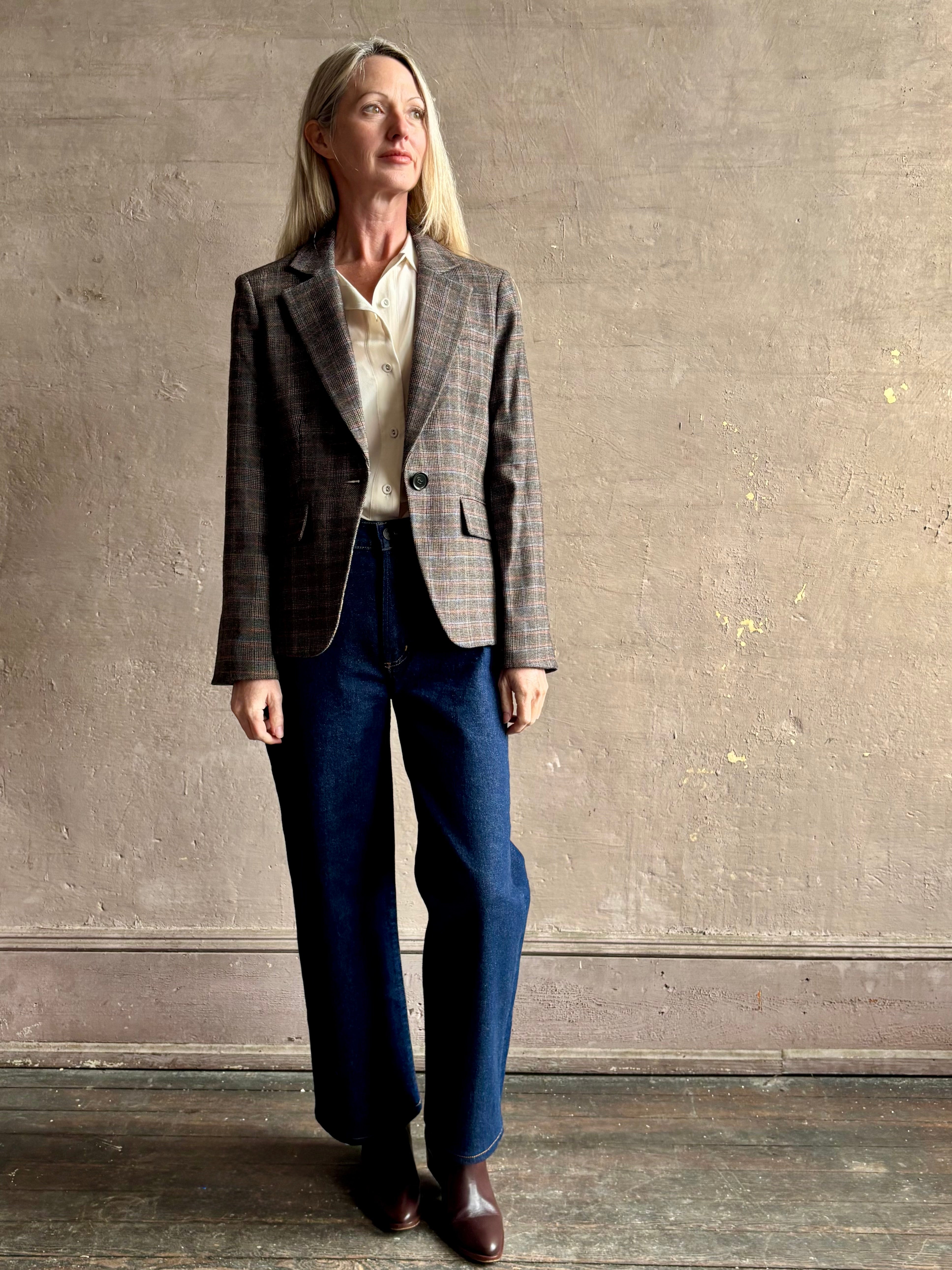 Woman wearing beautifully tailored VERONICA BEARD Tyra Dickey Jacket in Charcoal Multi with one button closure