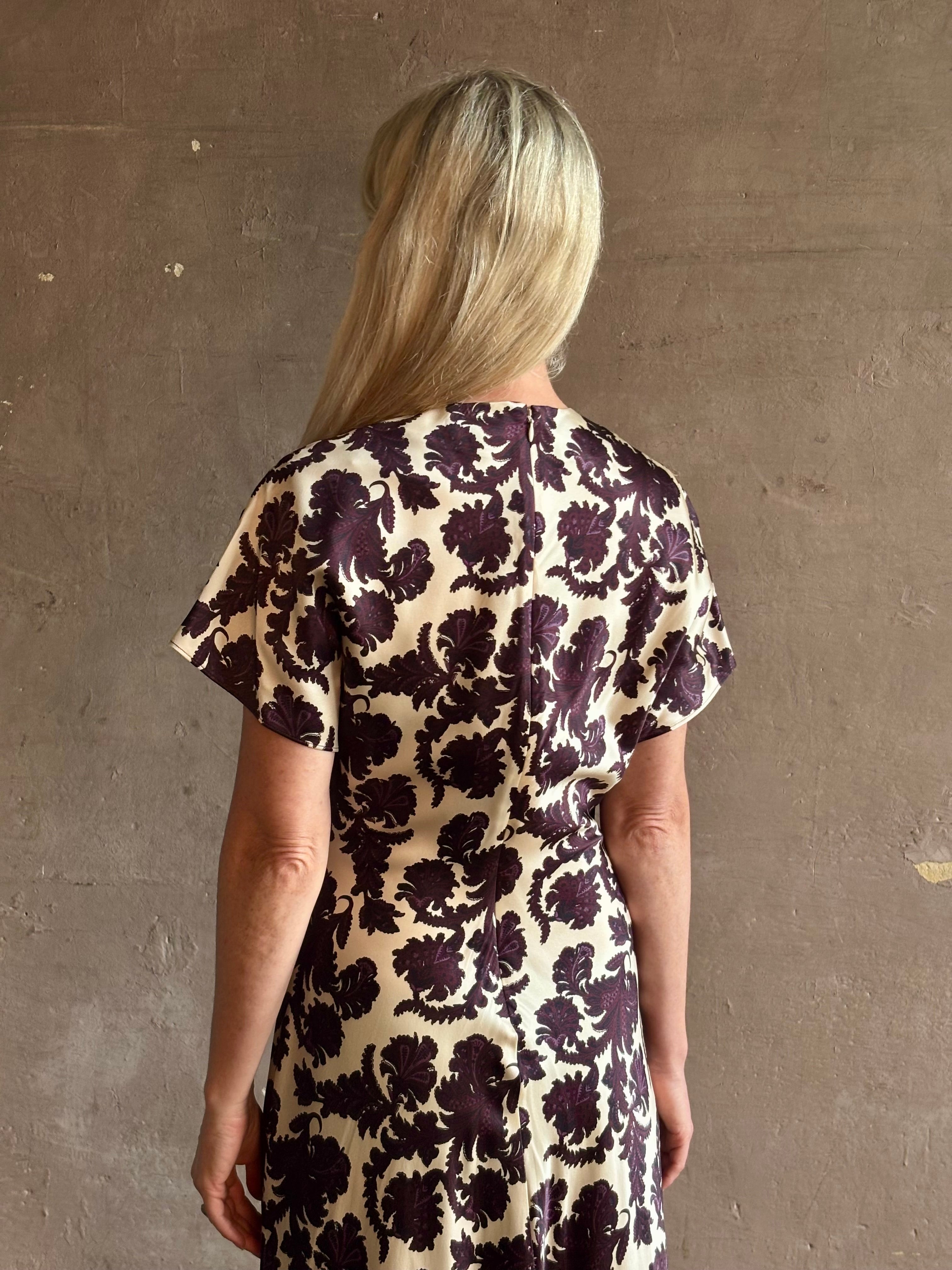 Mature woman wearing designer Veronica Beard V-Neck Redgrave Dress Ecru Multi short sleeves sheath maxi occasion-ready 