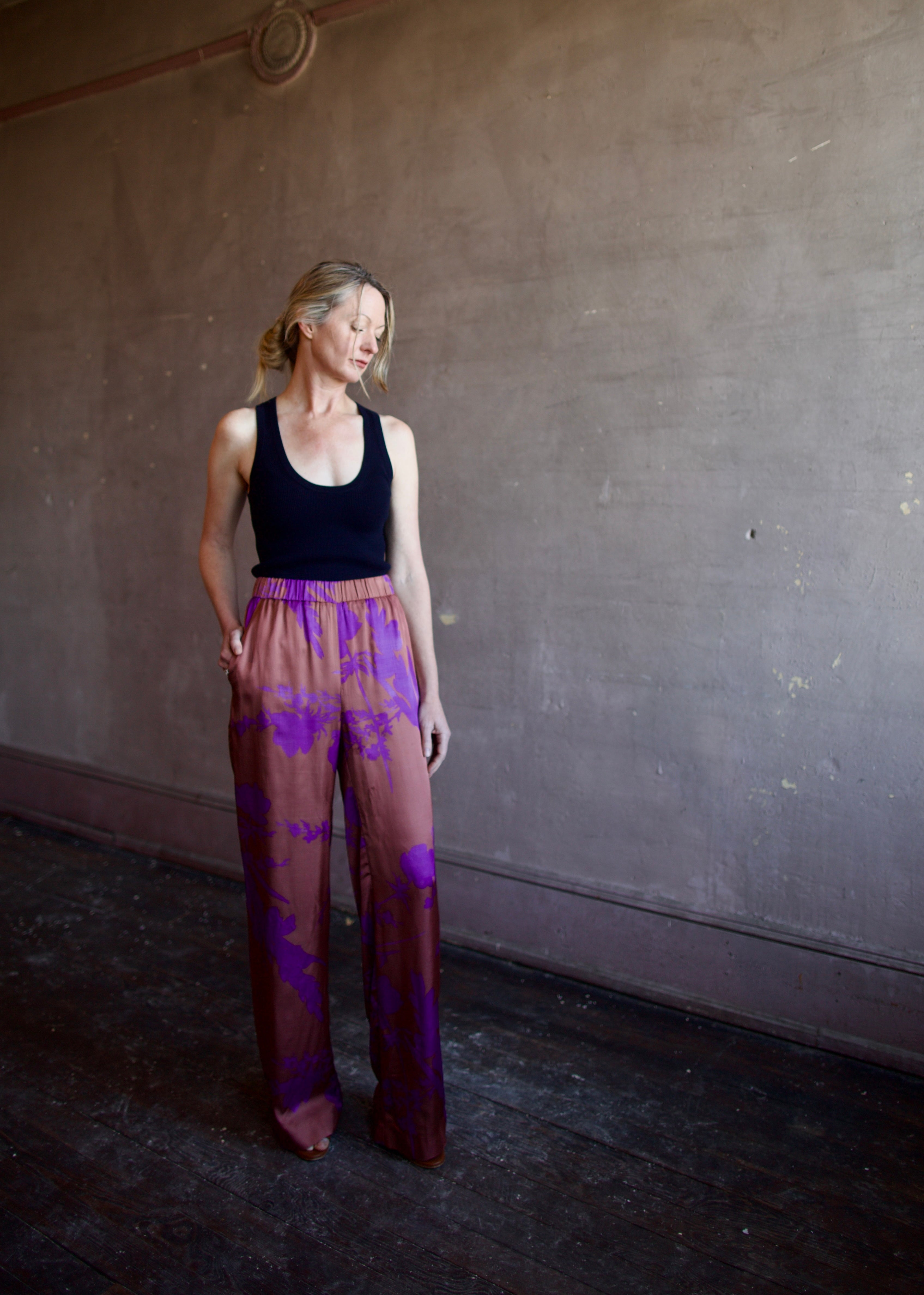 Image of woman wearing luxury brand Vanessa Bruno Cliff floral printed viscose pants features elastic waist, straight leg, side pockets and relaxed fit