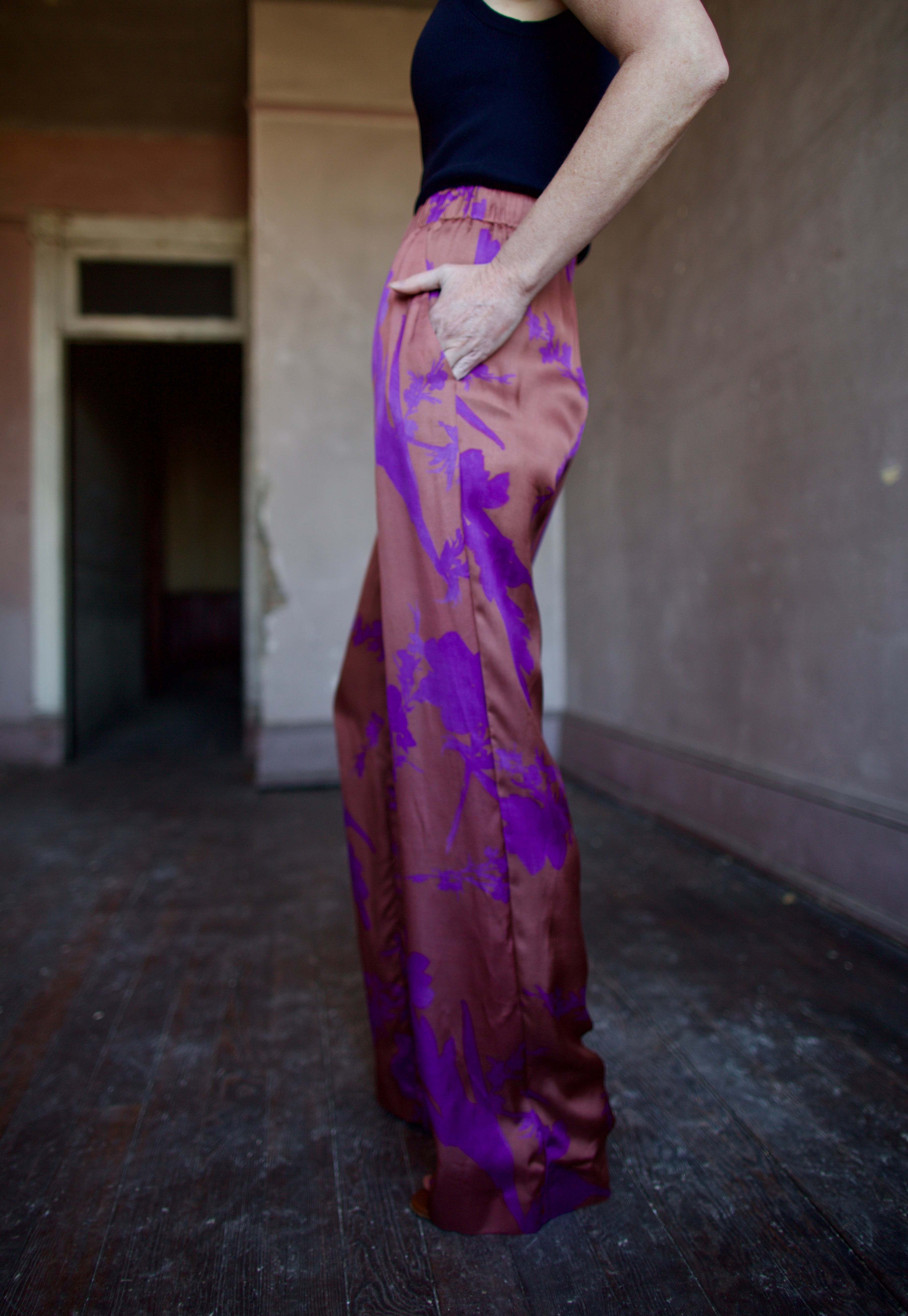 Image of woman wearing luxury brand Vanessa Bruno Cliff floral printed viscose pants features elastic waist, straight leg, side pockets and relaxed fit