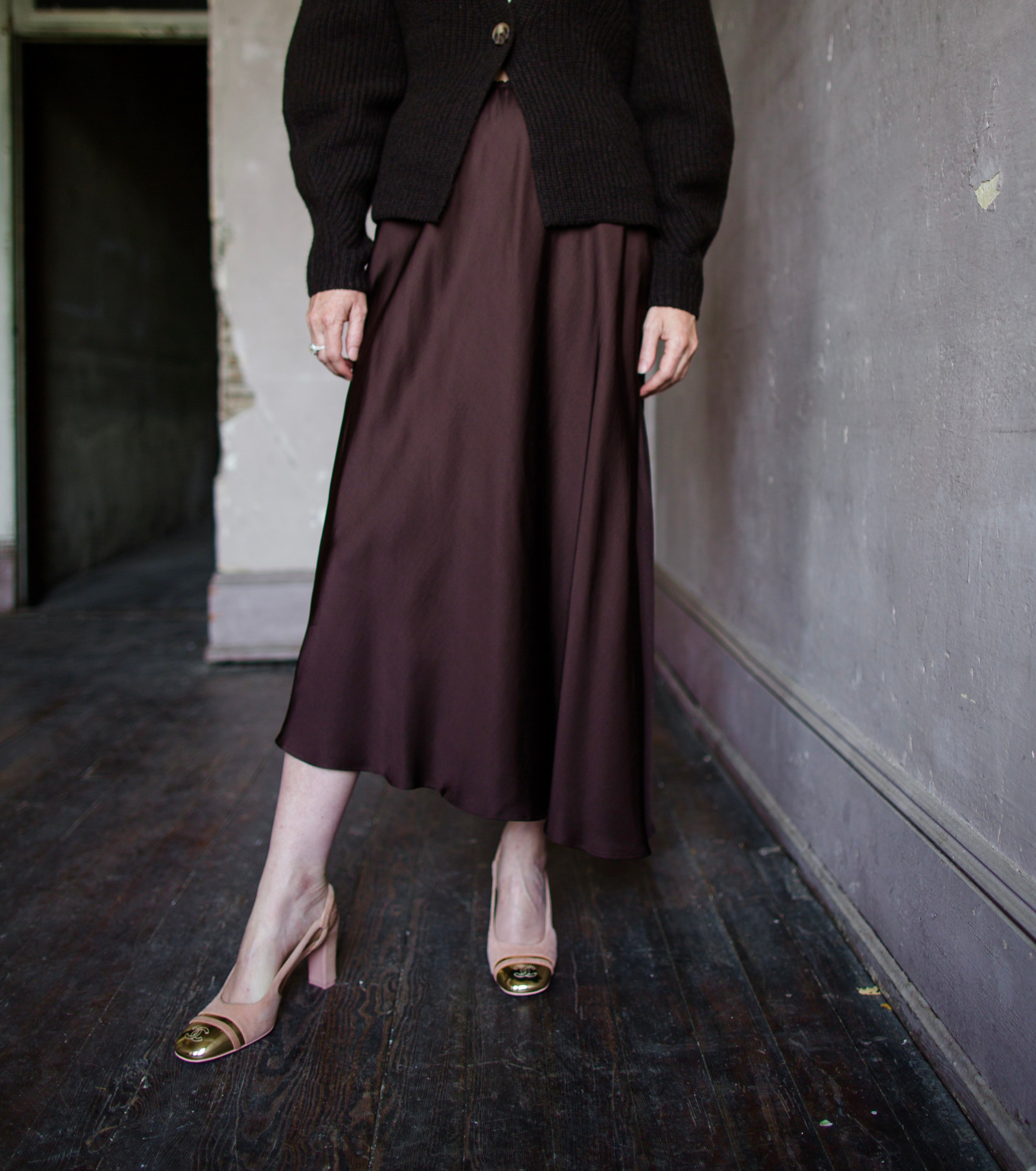 Front view woman wearing Vanessa Bruno Cruise slip skirt in viscose shade coffee