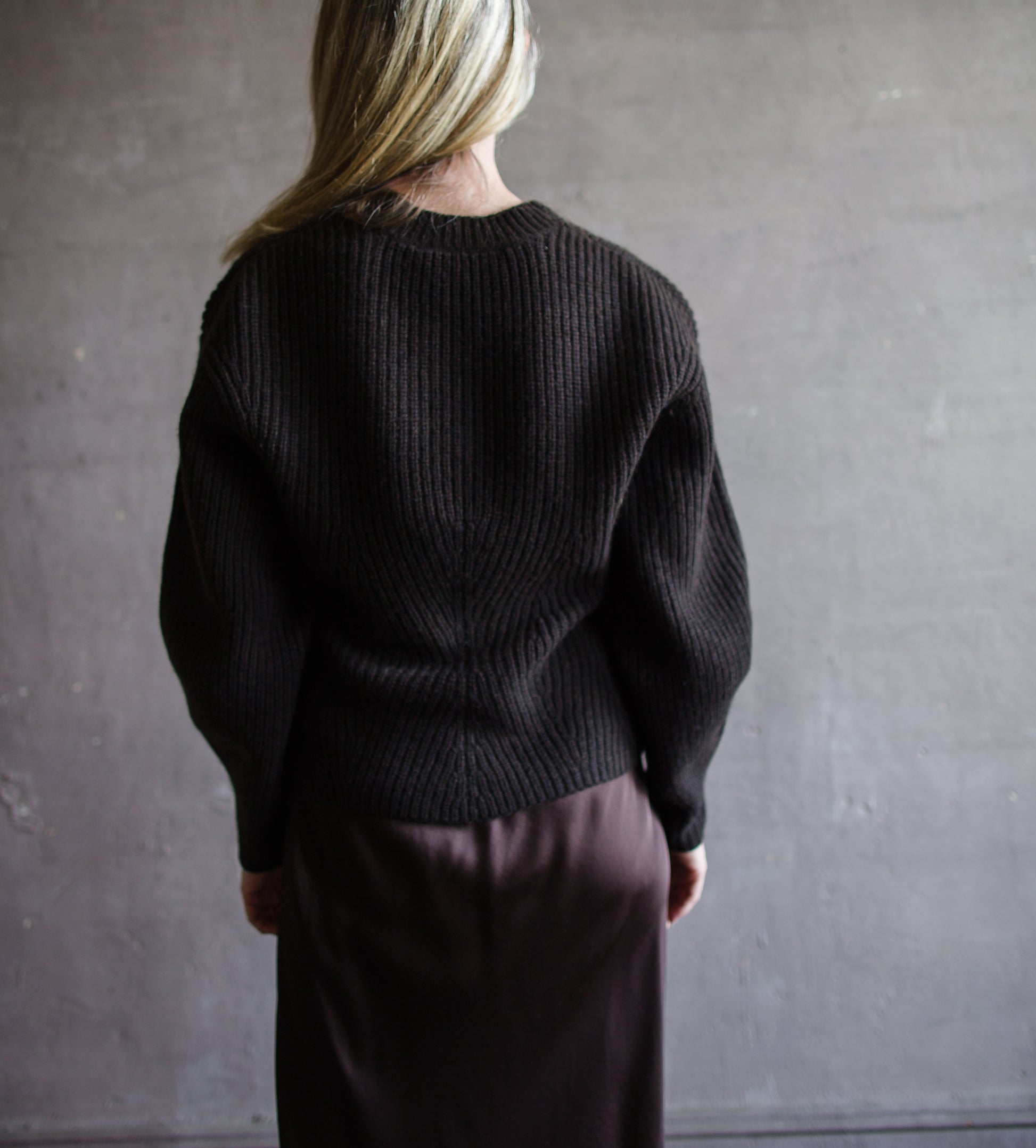 Back view of Woman wearing Vanessa Bruno Deloris wool blend cardigan in rich dark chocolate brown yak