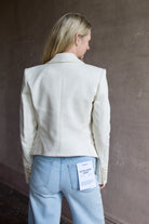 Back image of a woman wearing the Veronica Beard Diego Dickey Jacket