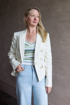 Image of a woman wearing the Veronica Beard Diego Jacket and Carlin Tank