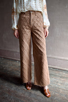 image of a woman wearing the Veronica Beard Taylor Cropped Jeans in Hazelnut Stone