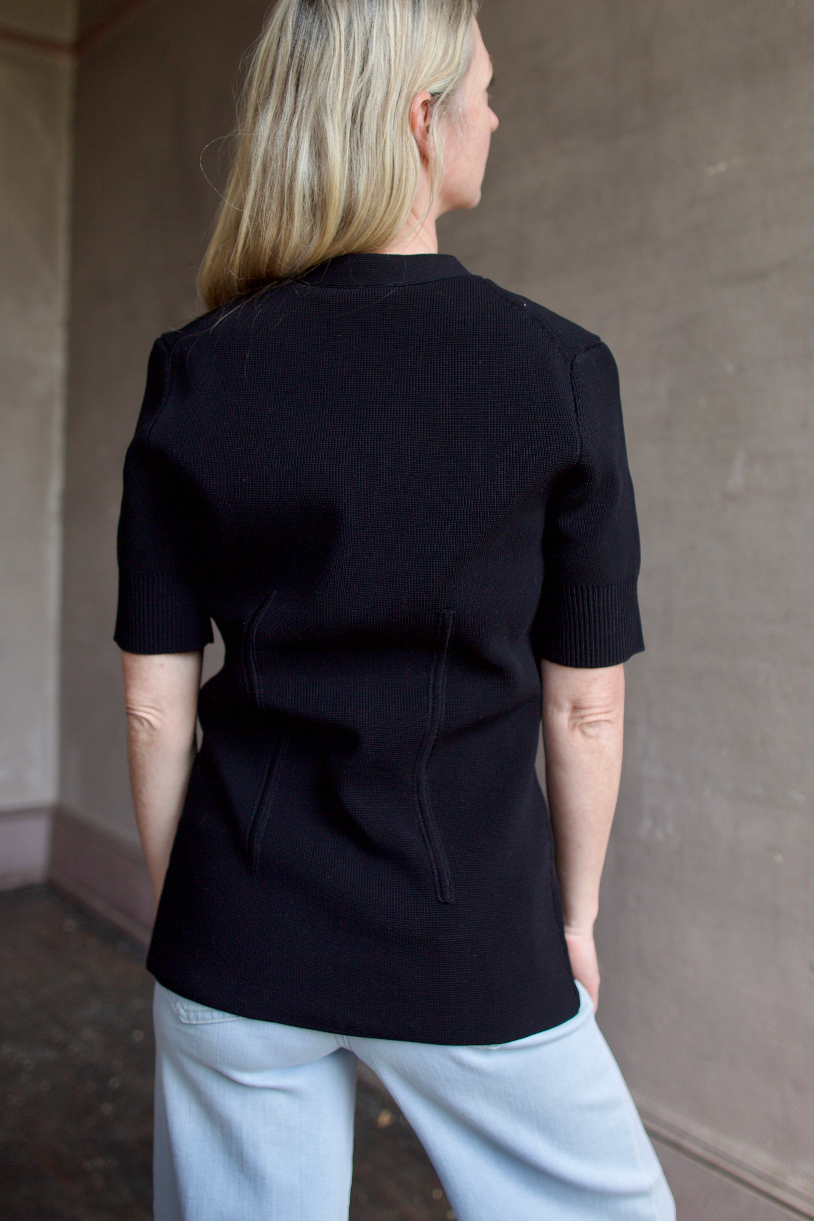 Model wearing premium designer Veronica Beard Wrenley cotton Cardigan showcasing timeless elegance and superior fabrication