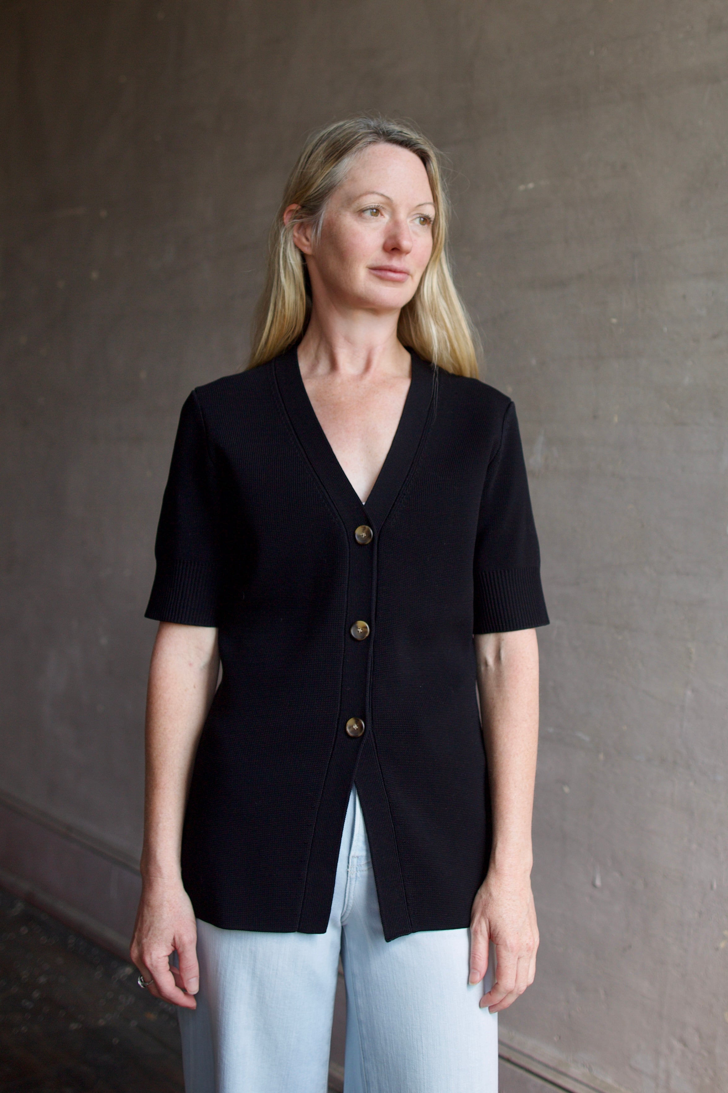 Model wearing premium designer Veronica Beard Wrenley cotton Cardigan showcasing timeless elegance and superior fabrication