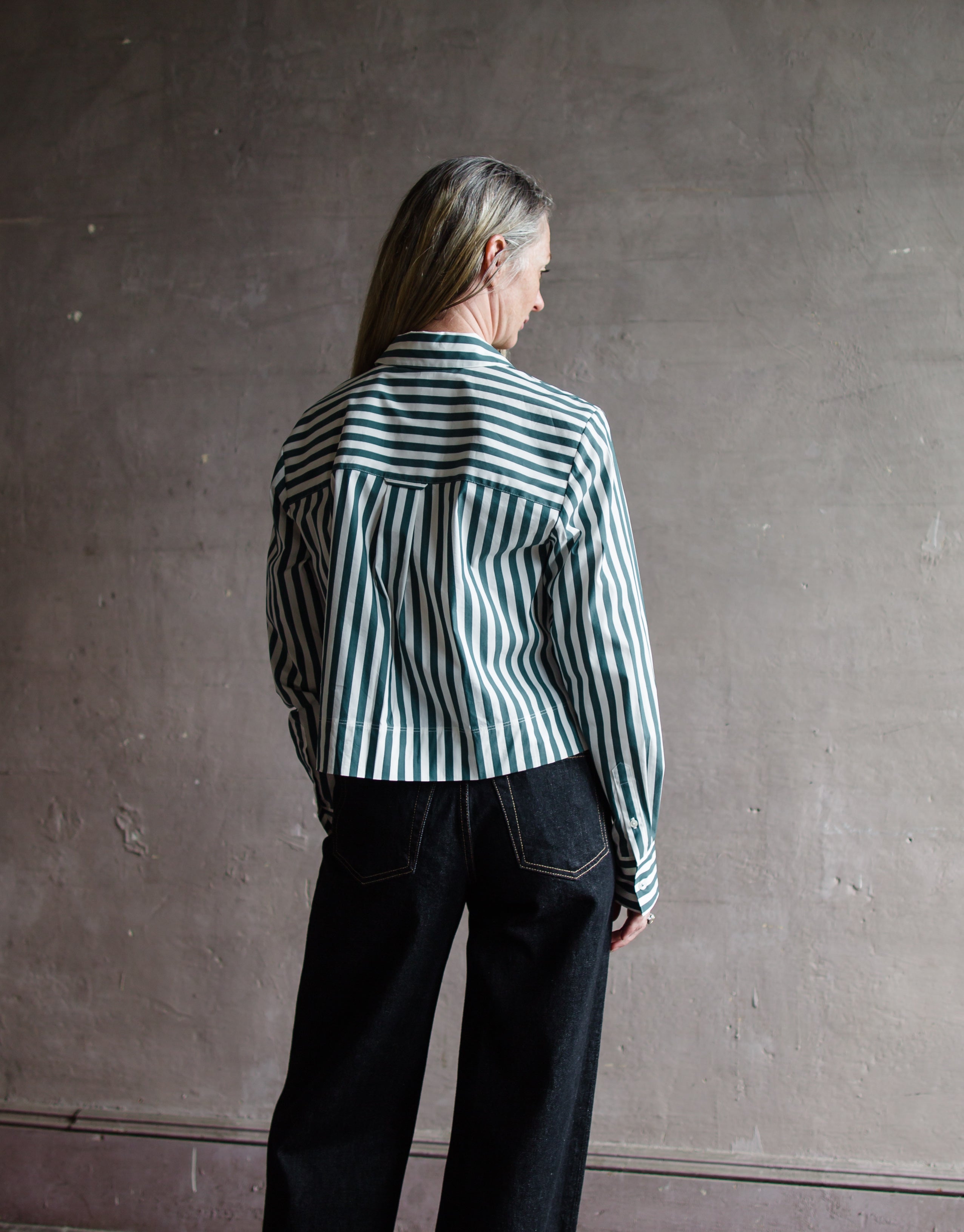 Image featuring a woman wearing he Maia striped top by Veronica Beard features a button front and boxy, slightly cropped fit.