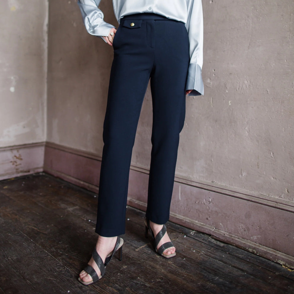 Image featuring a woman wearing the Veronica Beard Renzo Pants in Navy blue.