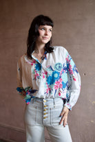 Image of a woman wearing the Alix of Bohemia Poet Juneberry Blouse