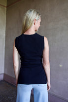 Back image of a woman wearing the Apiece Apart marca Knit Top