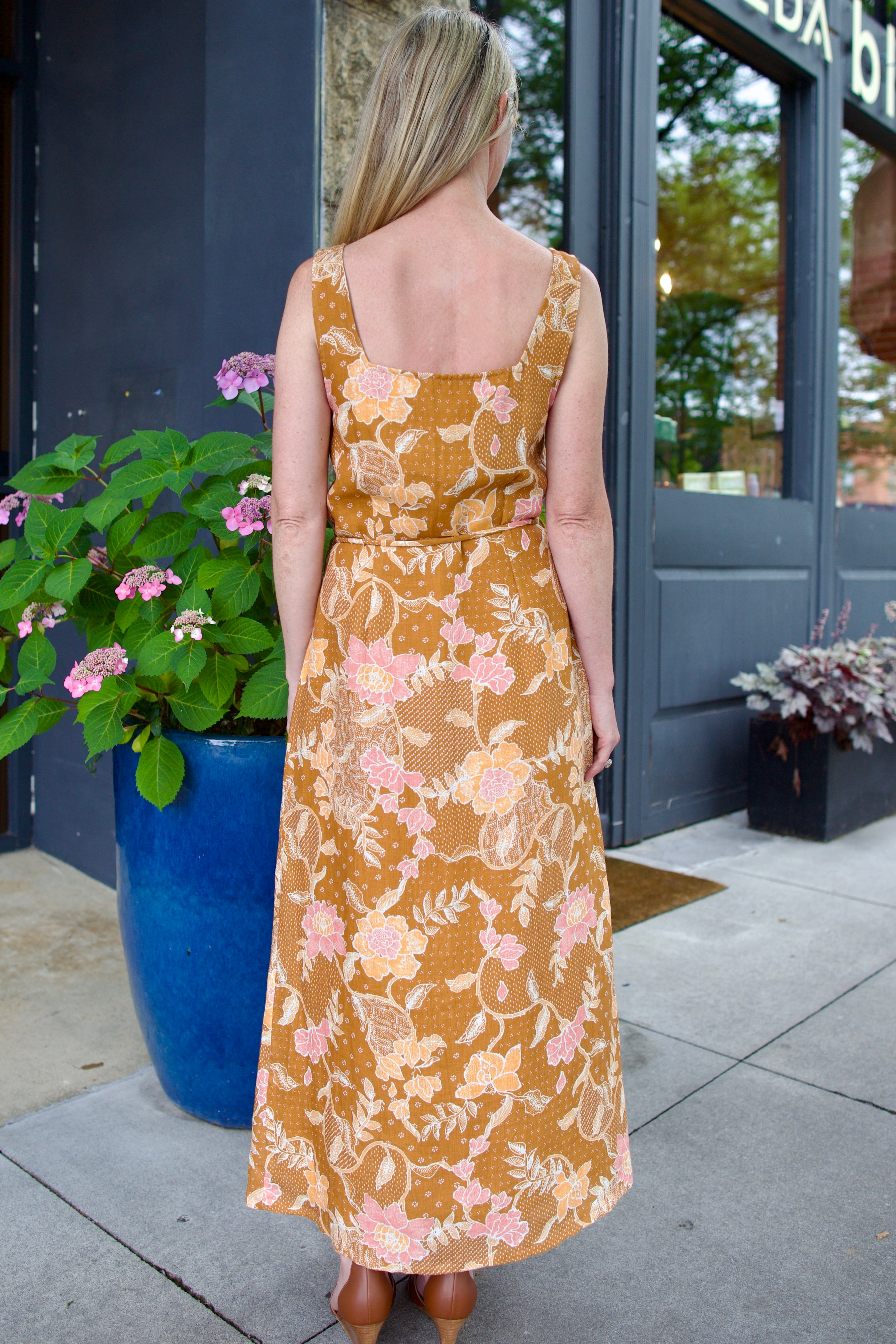Back image of a woman wearing the Hannah Artwear Paloma Dress