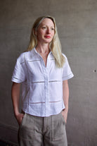 Image of a woman wearing the Le Jean Linen Eyelet Shirt