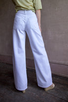 Back image of a woman wearing the Le Jean Luna Relaxed Jeans