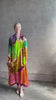 Mature woman reviewing the Critique Long Sleeve fluid Silk maxi Dress from Ulla Johnson in  wearable art abstract print via a collaboration with American painter Helen Frankenthaler