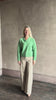 Video reviewing Guest in Residence Grizzly Double V Sweater Highland Green brushed cashmere with symmetrical front-and-back V-neckline