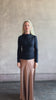 Video of woman reviewing Proenza Schouler WL Mini Jersey Top long sleeves mock neck slim fit with lots sculptural draping