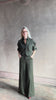 Video reviewing luxury clothin TWP next ex cotton poplin dark green rosin button-up shirt with rolled sleeves and collar