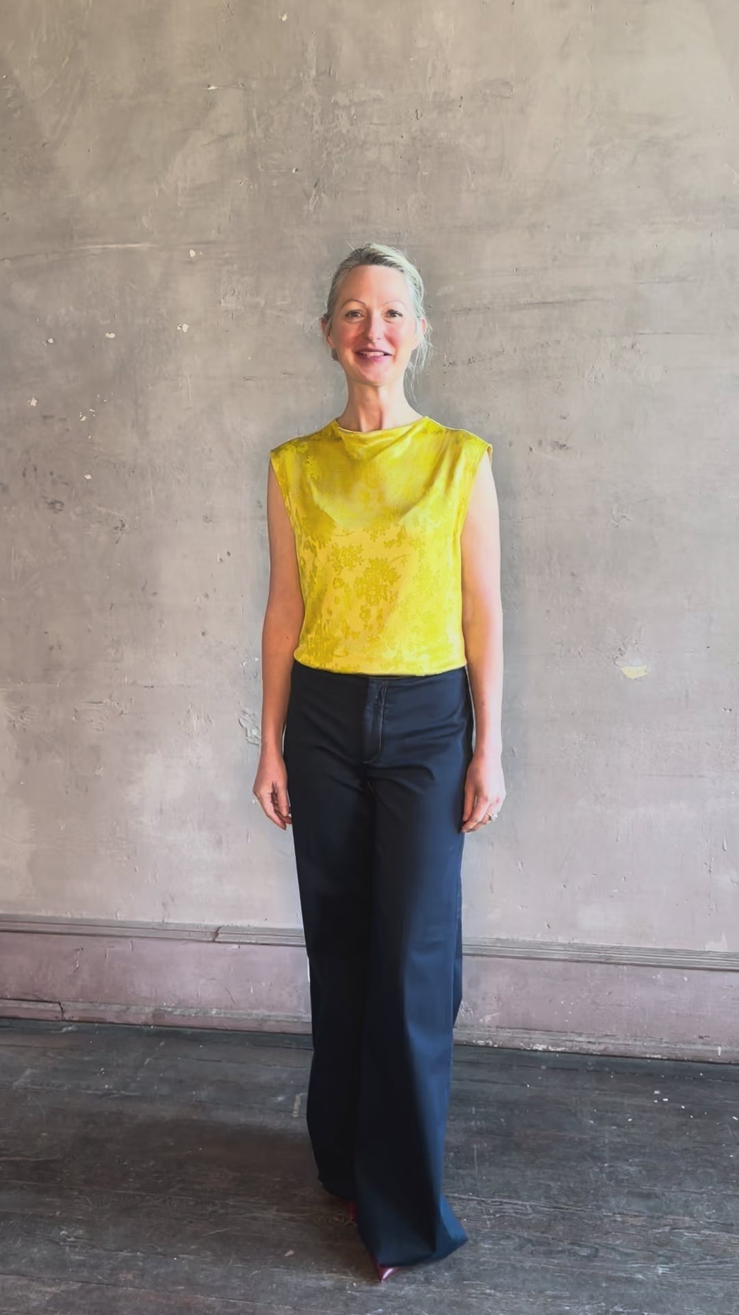 Video reviewing Rachel Comey Primula Pique Knit Top in Mustard yellow waterfall front tone-on-tone jacquard floral made in the USA