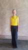 Video reviewing Rachel Comey Primula Pique Knit Top in Mustard yellow waterfall front tone-on-tone jacquard floral made in the USA