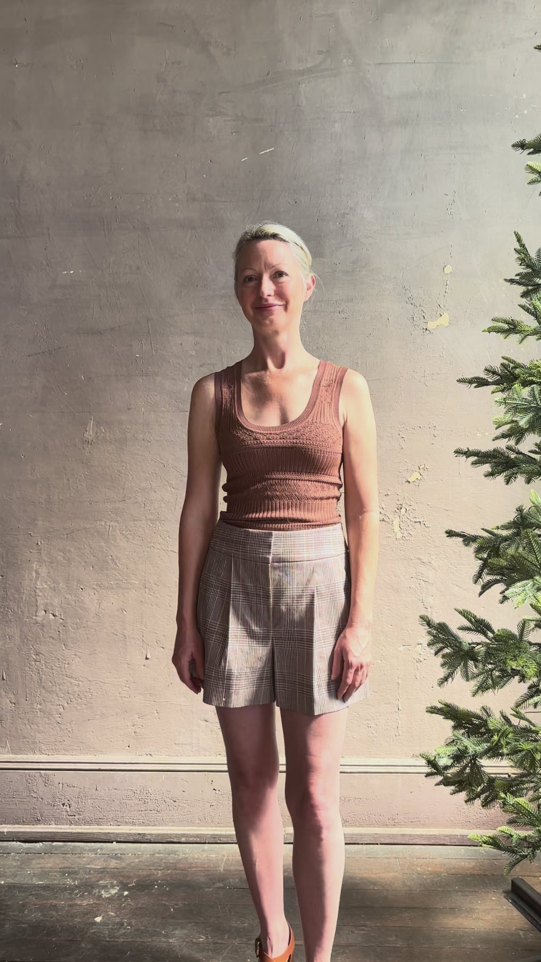 Mature woman in video reviewing Veronica Beard Haina elevated plaid short with side pockets and front pleat