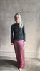 Woman wearing Proenza Schouler Blythe charcoal Top reversable long sleeves wool side ruching luxe draping