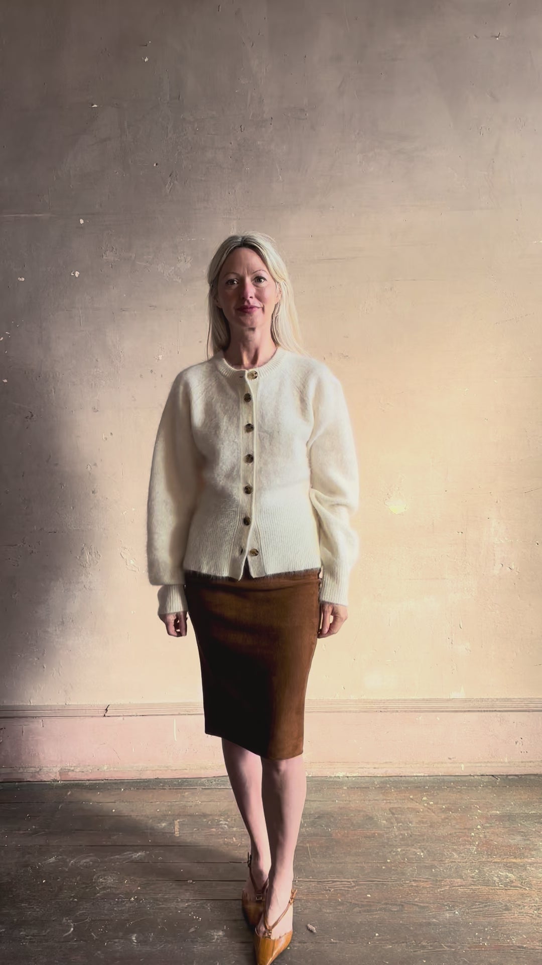 Video reviewing Guest in Residence Grizzly Sculptured Cardigan in Cream brushed cashmere ribbed trims and contrasting brown buttons. Plush, cloud-soft