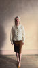 Video reviewing Guest in Residence Grizzly Sculptured Cardigan in Cream brushed cashmere ribbed trims and contrasting brown buttons. Plush, cloud-soft