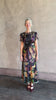 Video reviewing Saloni's Gwen C Dress in Equinox Plmt silk blend fit-and-flare silhouette cummerbund waist. Botanical, structured occasion elegance.