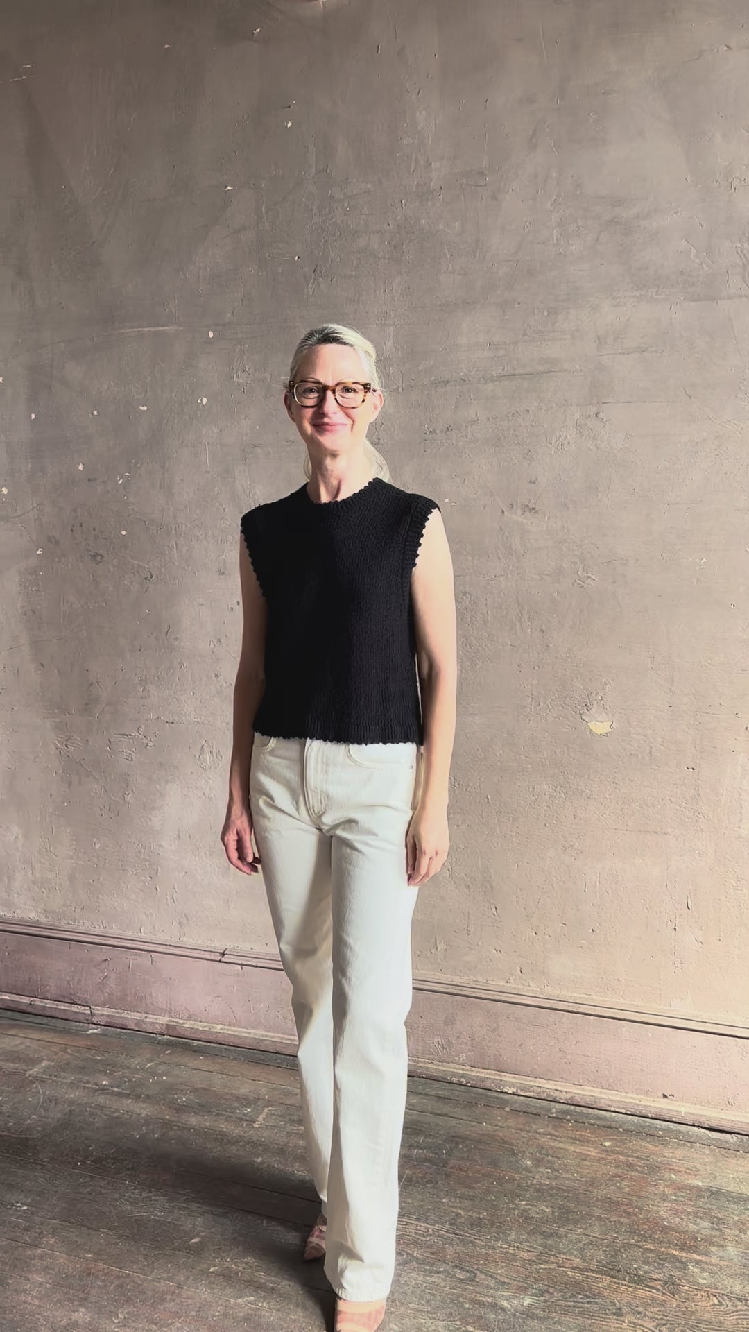 video reviewing Rachel Comey designer Relent sleeveless black cotton knit top scalloped edges 
