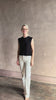 video reviewing Rachel Comey designer Relent sleeveless black cotton knit top scalloped edges 