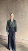 Video reviewing Trovata's Pauline Blouse in Marin Ditsy cotton poplin long sleeves v-neckline small floral print