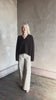 Video reviewing Nili Lotan's Isley Sweater Dark brown cashmere-silk  relaxed V-neck silhouette. Ultra-luxe